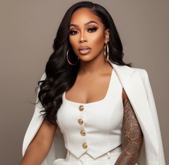 Antoinette Wright independent life insurance professional sitting chic in white suit